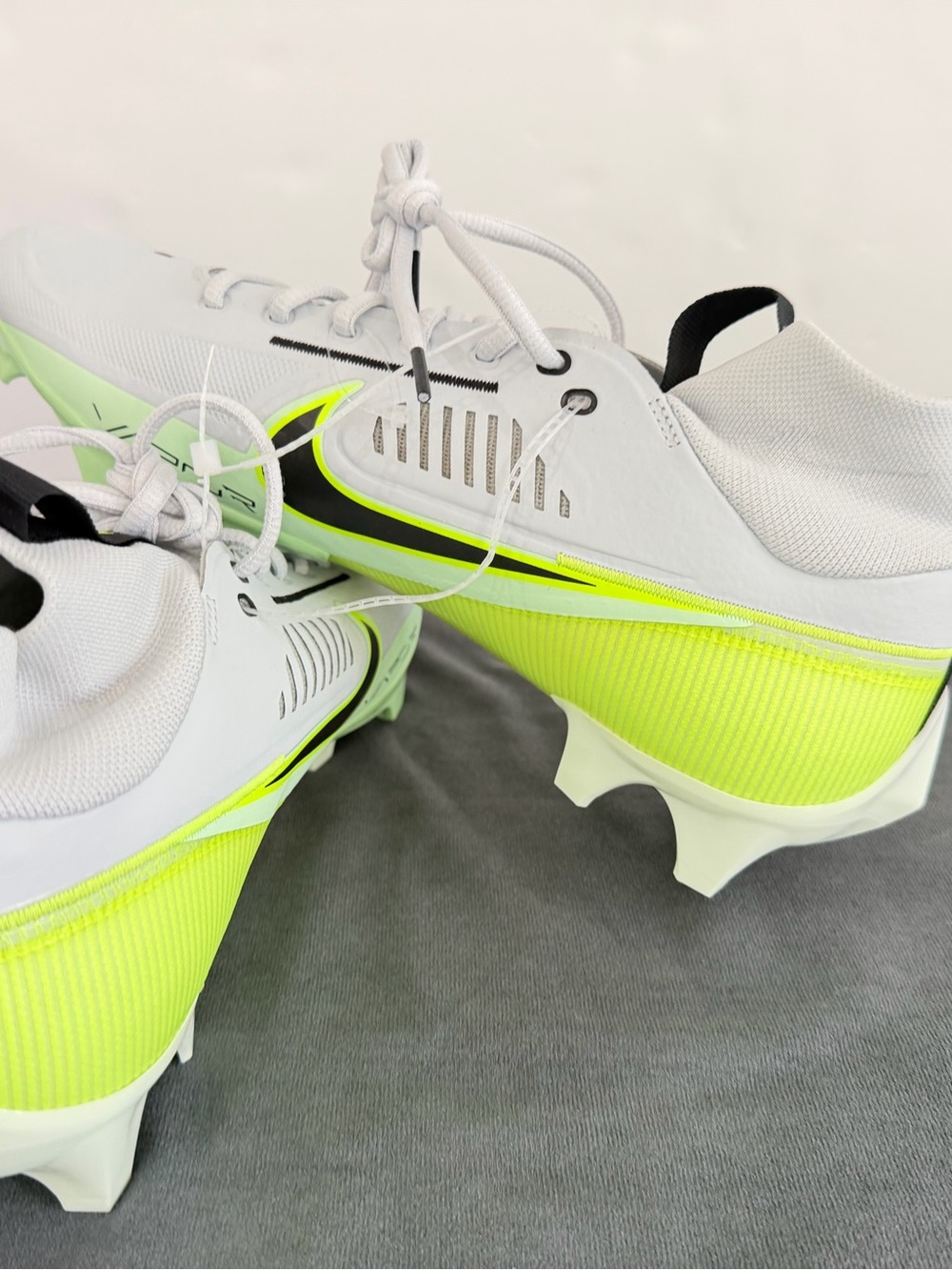 Nike Men’s White Athletic Cleats with Neon Yellow Accents - Picture 10 of 10